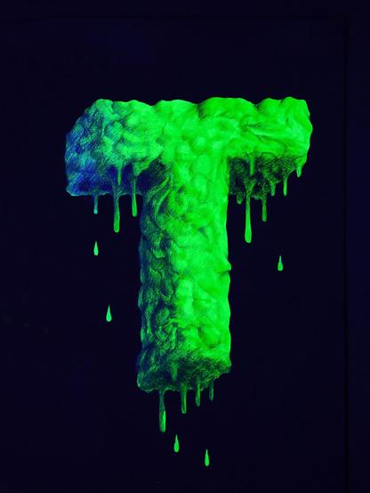 Glowing letter T painted on a black background. It is given the effect of being three dimensional with a gunky green liquid enveloping it and dripping downwards, with some drops falling off the bottom.