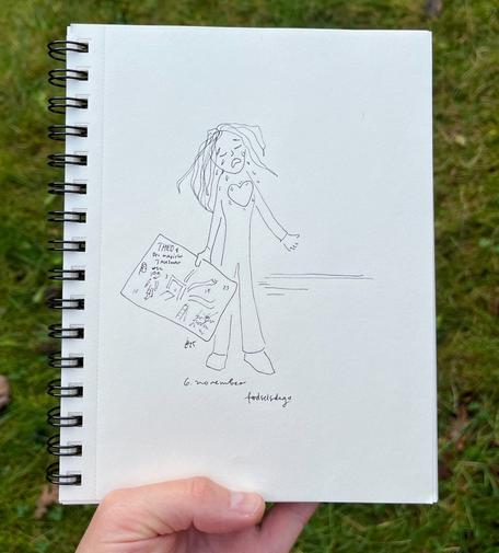 Photo of a fineliner drawing of a person standing up and crying. Their heart is big and throbbing and in their hand is an advent calendar that goes with the Danish tv advent calendar of this year. The text explains how the calendar used to be a gift from mom and now that mom is no more, it’s a gift from partner.