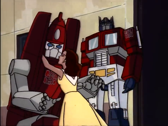 Screenshot from the Transformers G1 cartoon. Optimus Prime looks on as Powerglide, a Transformer, crouches and receives a kiss on the faceplate from Astoria, a human woman. This references a post on another site in which Batman watches a furry couple holding hands, with a similar caption.