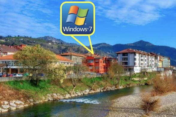 Una imagen de archivo de un pueblo de Asturias y el logo de Windows 7 (Getty Images)