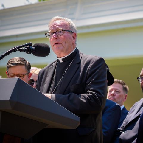 Bishop Robert Barron, a member of the Trump administration’s Religious Liberty Commission, speaking at the White House in May. He said this week that he had raised concerns about detainees’ access to sacraments with senior officials at the State Department and the Department of Homeland Security.