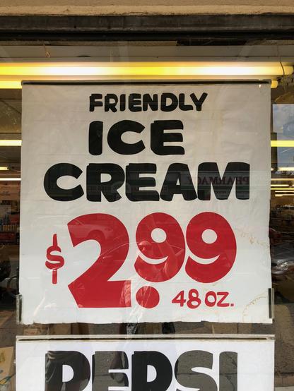 Hand-painted sign reading "Friendly Ice Cream $2.99 48oz"