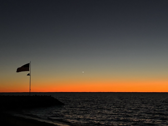 The orange glow of the remnants of the sunset over the Chesapeake bay