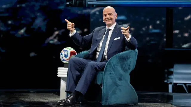 Gianni Infantile sitting in a chair