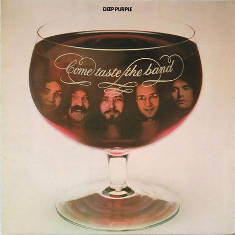 The front cover of Deep Purple's 1975 album "Come Taste The Band". The bands faces are superimposed over a wine glass, against an off-white background.