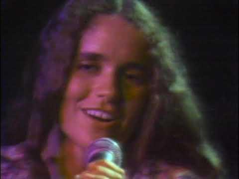still of Nicolette Larson singing Lotta Love