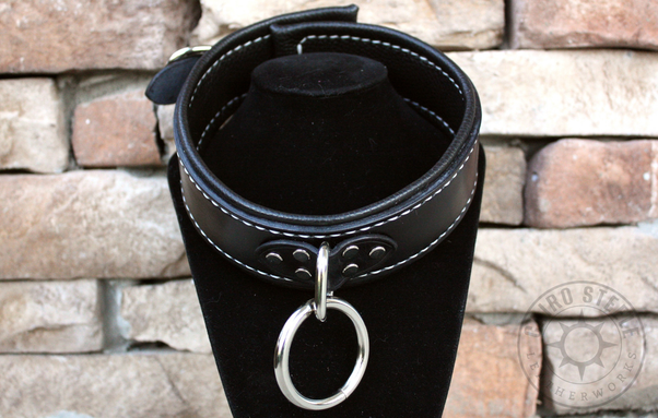 The black and nickel collar on a black stand