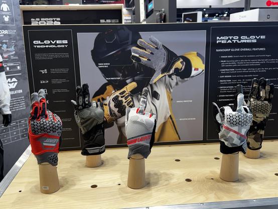 Gloves on a display stand with various gestures posed