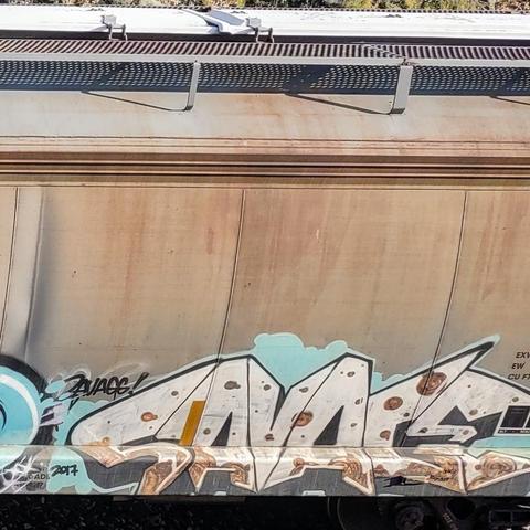 Train car with graffiti rolling through Kamloops BC Canada