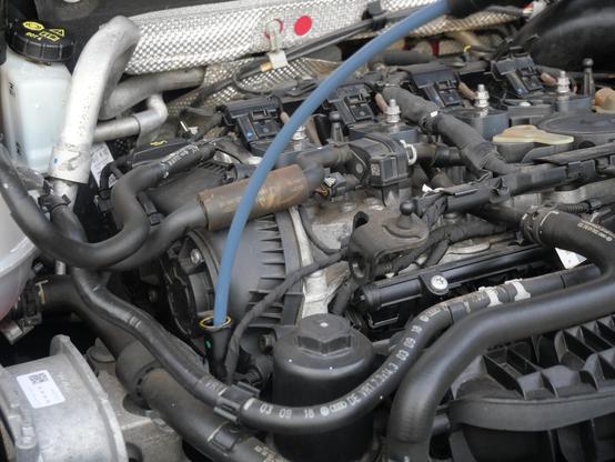 The oil filter is on the top, so you don't have to get under the car to access it