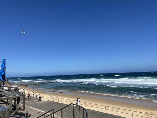 Looking out to sea over Bar Beach on a sunny day.
