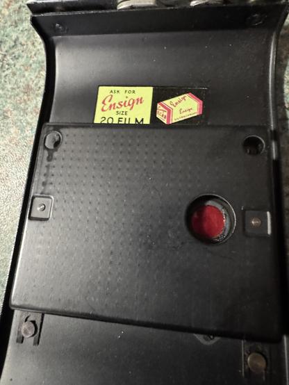 Close up of the inner rear cover of the Selfix showing a label saying “ Ask for Ensign Size 20 film”