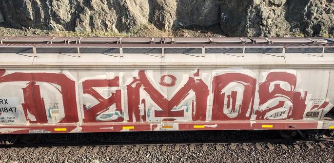 Train car with graffiti rolling through Kamloops BC Canada