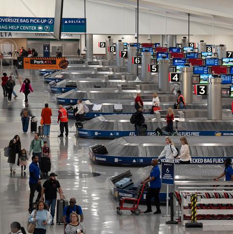 Hartsfield-Jackson Atlanta International Airport on Friday. Airlines canceled hundreds of flights each day from Friday through Sunday at airports serving major cities like Atlanta, Denver, Chicago and New York.