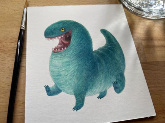 painting of a very happy looking little lizard/dinosaur/monster chap. He's teal green and his mouth is wide open in a big smile showing all his gappy teeth. He has bright yellow eyes and he's trotting along with his tail in the air