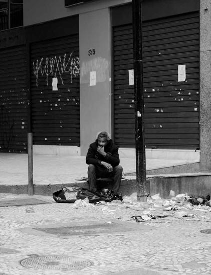 person sitting near building
