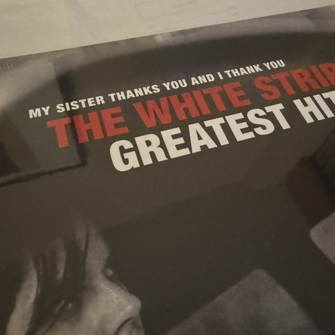 The cover of a record with title „my sister thanks you and I thank you. The white stripes. Greatest hits.“