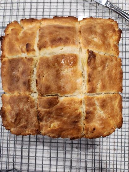 Close-up of Buttermilk biscuits cooling on a rack on my countertop. They smell wonderful.