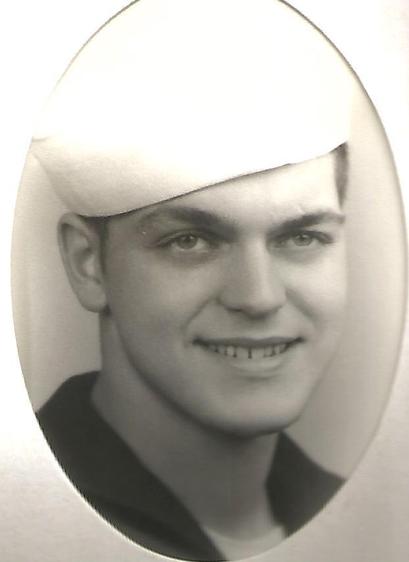 US Navy -Black & white picture of sailor in white cap.