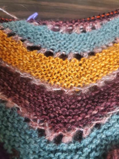 Close up showing pink mohair eyelet between stripes