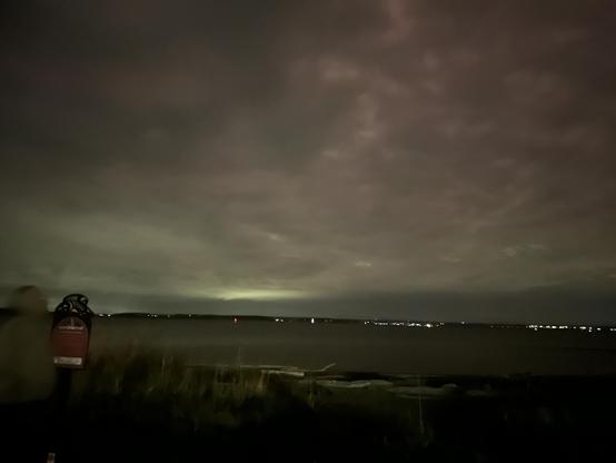 A bit of the aurora behind some clouds