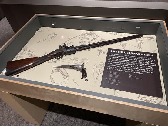 A pair of early 19th century experimental guns: an 1819 revolving flintlock rifle designed by Cornelius Coolidge and an 1835 bayoneted revolver designed by Samuel Colt.