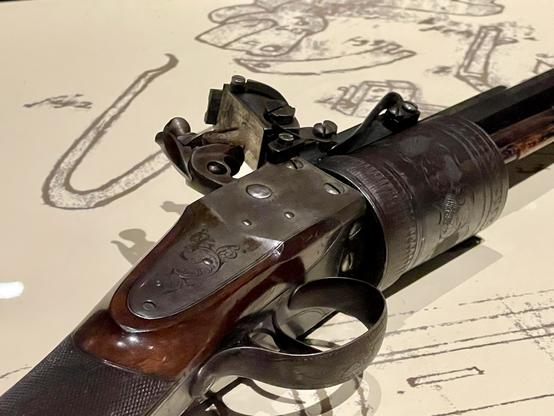 Detail of the firing mechanism and cylinder of the experimental 1819 revolving flintlock rifle designed by Cornelius Coolidge.