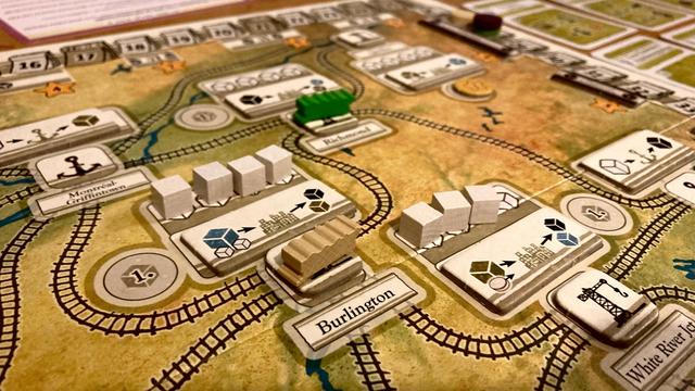 the game board of The Great Trunk Journey with tokens and components on it