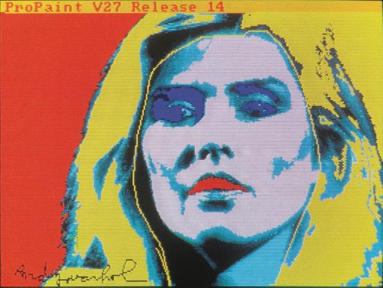 Portrait de Debbie Harry du groupe Blondie sur Amiga. La mention "propaint V27 release 14" est visible sur un bandeau en haut de l'écran.