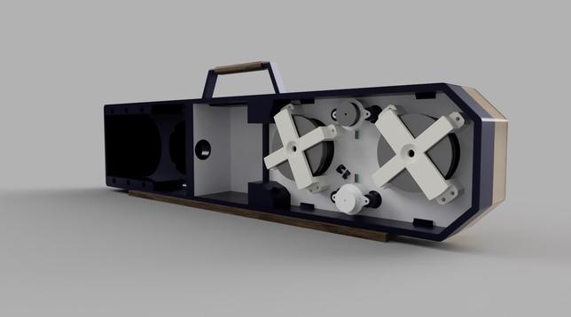 The rear cavity of a reel to reel boombox modeled on the Harmon Wowshi W02 from Disco Elysium, with tape mechanism highlighted in white to show details of the brackets and motors.