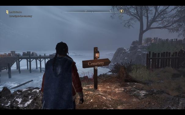 Antea stands in front of a sign: Cemetery ➡️