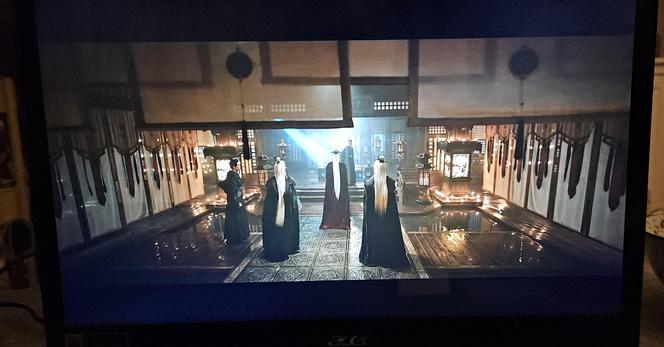 A court hall for the Shadow sect. The floor before the podium consists of a cross shaped pier between four pools. We've yet to know if there's koi or blood thirsty pirañas in the water.