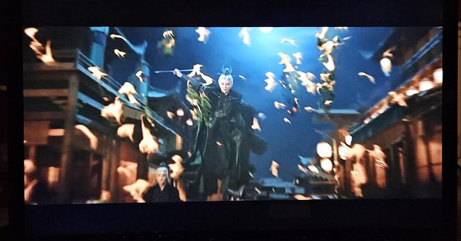 One of the white haired baddies fighting by writing cursed fire characters that flies through the air like glowing snow.