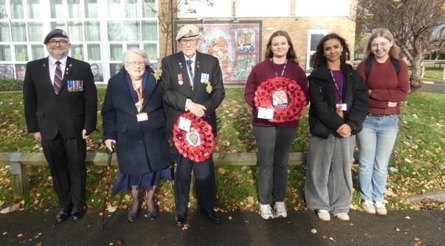 <img alt="Remembrance Day Service at The King Alfred School Academy" src="https://www.goodnewspost.co.uk/content/images/2025/11/Image-7.jpg" /><p><strong>&#xa0;<br />By Gracie H (14), Jill Dando News Correspondent</strong></p><p><strong>On Tuesday 11th November, The King Alfred School Academy held a moving Remembrance Day service to honour those who gave their lives in World War I, World War II, and other wars. </strong></p><p>Students, staff, and members of the Royal British Legion and the wider community gathered to commemorate the event.</p><p></p><figure class="kg-card kg-image-card kg-card-hascaption"><img alt="Remembrance Day Service at The King Alfred School Academy" class="kg-image" height="393" src="https://www.goodnewspost.co.uk/content/images/2025/11/Image-9.jpg" width="690" /><figcaption><span style="white-space: pre-wrap;">Image credit TKASA</span></figcaption></figure><p><br />Representatives from a wide range of youth organisations stood together, including Scouts, Badgers, Sea Cadets, Army Cadets, Air Cadets, Girlguides, Prefects, and Head Students. </p><h2 id="many-wore-their-medals-and-uniforms-with-pride">Many wore their medals and uniforms with pride.</h2><p><br />The service began with a poem read by the Head Students, followed by a collective reading from the Prefects: &#x201c;We will remember them.&#x201d;&#xa0;&#xa0;</p><figure class="kg-card kg-image-card kg-card-hascaption"><img alt="Remembrance Day Service at The King Alfred School Academy" class="k