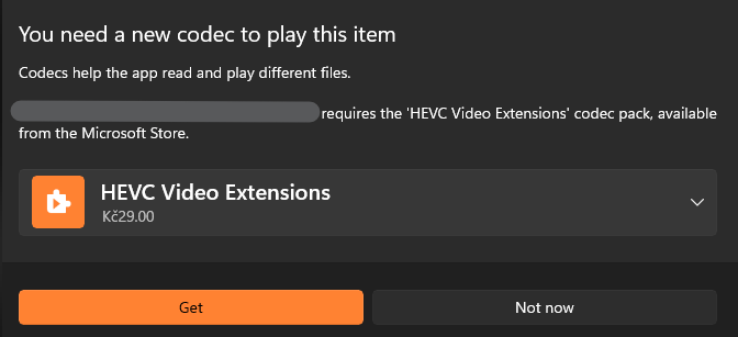A Windows Media Player dialog with the following text:

"You need a new codec to play this item.

<the file> requires the HEVC Video Extensions codec pack, available from the MIcrosoft Store."

Below it is a link to the store, where the Codec Pack is sold for 29 CZK (1.5EUR).