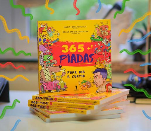 Foto da capa do livro colocada sobre um monte de livros de piadas.