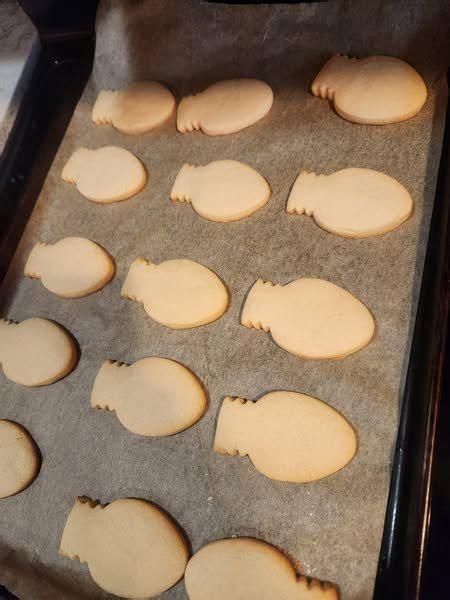 A tray of cookies made with a butt plug cutter