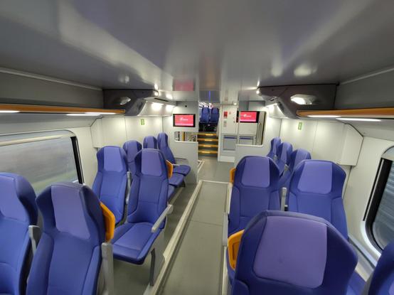 Interior of the train. Blue seats.