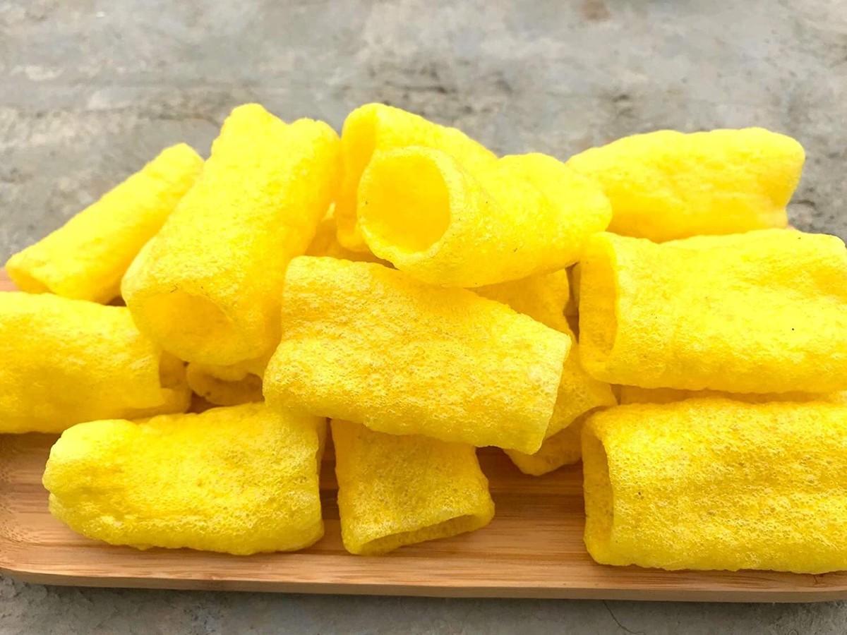 FRYUM Papadums (aka goldfingers)
* a very light fried salty snack -- hollow yellow tubes -- that kids can place on their fingers