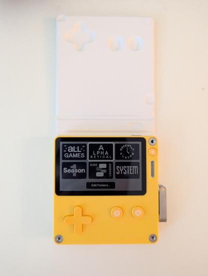 Playdate console on main screen.