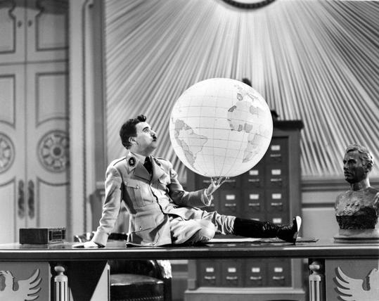 A screenshot from the movie The Great Dictator starring Charlie Chaplin.