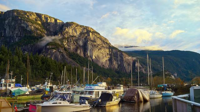 Video still of Squamish, BC, Canada, showing the Stawamus Chief in golden light and a marina in the foreground.