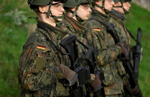 Germany agrees to keep military service voluntary