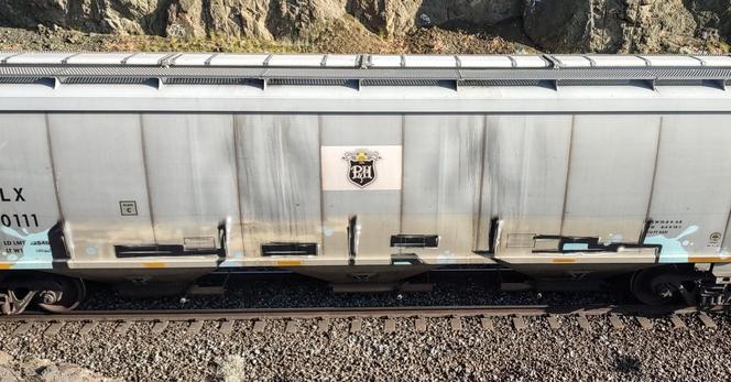 Train car with graffiti rolling through Kamloops BC Canada