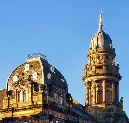 The roofline of a French Renaissance style building in Glasgow.