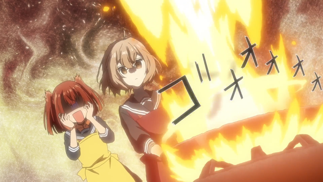 A still from the anime "This Monster Wants to Eat Me". Two girls are standing over a frying pan that is massively, spectacularly on fire. Flame from the hob engulfs the pan, which in itself is shooting fire up into the air. The girl handling the pan is watching it with a somewhat neutral expression. The other looks on with a horrified look on her face.