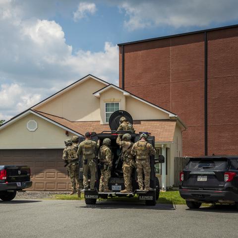 Immigration and Customs Enforcement agents conducting a drill at a federal training center near Brunswick, Ga.