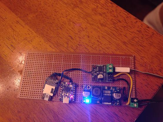 A prototyping board holds several interconnected modules. A microSD card slot is attached to an ESP32-C3 super mini, which is wired to a Texas Instruments DRV8871 motor driver, used to electrify the track.

The remaining module is an adjustable voltage regulator to supply 5V to the esp32, from the 12V supplied to the track via the motor driver.