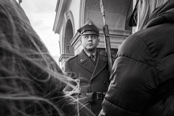A soldier peers out the sides of his eyes during a changing of the guard ceremony at Warsaw’s Grave of the Unknown Soldier