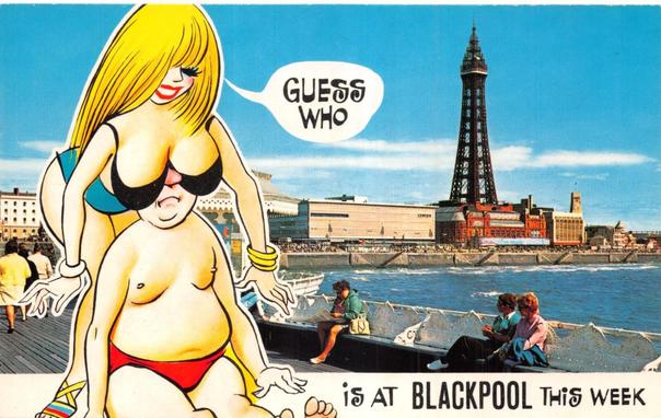 A cartoon blonde woman with extremely  large breasts standing behind a seated man.  Her breasts are covering his eyes.  She's asking 'Guess who?' A photo of Blackpool tower is on the right and the caption continues 'is at BLACKPOOL this week'